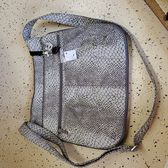 𝅺TRAVELON crossbody purse NWOT snakeskin print with mini flashlight - Picture 1 of 4